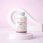 Menopause Relief supplement bottle on a pink background